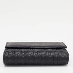 Pre Owned Carolina Herrera Black Monogram Embossed Leather French Compact Wallet