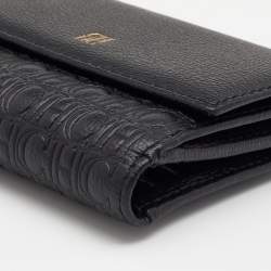 Pre Owned Carolina Herrera Black Monogram Embossed Leather French Compact Wallet