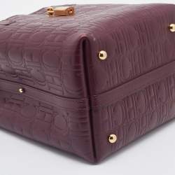 Pre Owned Carolina Herrera Burgundy Monogram Embossed Leather Small Matryoshka Locked Tote