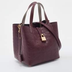 Pre Owned Carolina Herrera Burgundy Monogram Embossed Leather Small Matryoshka Locked Tote