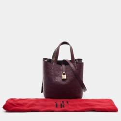 Pre Owned Carolina Herrera Burgundy Monogram Embossed Leather Small Matryoshka Locked Tote
