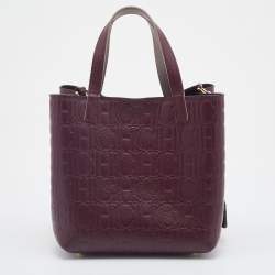 Pre Owned Carolina Herrera Burgundy Monogram Embossed Leather Small Matryoshka Locked Tote