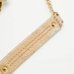 Pre Owned Carolina Herrera Gold Monogram Embossed Leather Bow Flap Shoulder Bag