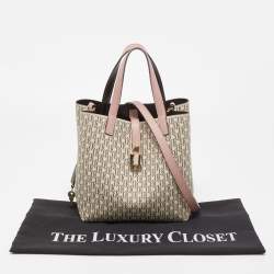 Pre Owned حقيبة يد كارولينا هيريرا قفل ماترايوشكا جلد وكانفاس مقوى مونوغرامى وردية / بيج 