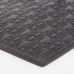 Pre Owned Carolina Herrera Black Monogram Embossed Leather Zip Wristlet Pouch