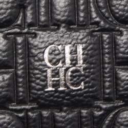 Pre Owned Carolina Herrera Black Monogram Embossed Leather Zip Wristlet Pouch