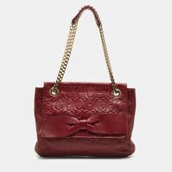 Carolina Herrera Red Monogram Embossed Leather Bow Shoulder Bag