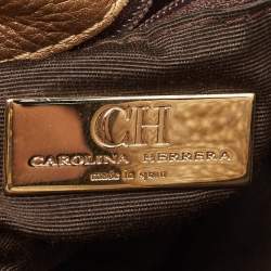 Pre Owned Carolina Herrera Gold Monogram Embossed Leather Bow Bucket Hobo