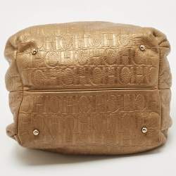 Pre Owned Carolina Herrera Gold Monogram Embossed Leather Bow Bucket Hobo