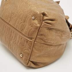 Pre Owned Carolina Herrera Gold Monogram Embossed Leather Bow Bucket Hobo
