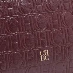 Carolina Herrera Burgundy Monogram Embossed Leather Zip Wristlet Pouch