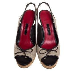 مملوكة مسبقًا CH Carolina Herrera Beige Canvas And Leather Trim Bow Cork Wedge Slingback Sandals Size 38