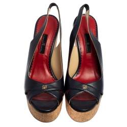 مملوكة مسبقًا صندل سي إتش كارولينا هيريرا نعل سميك فتحة كعب نعل روكى جلد أزرق مقاس 40