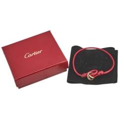مملوكة مسبقًا Cartier Trinity de Cartier 18K Three Tone Gold Adjustable Red Cord Bracelet