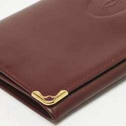 مملوكة مسبقًا Cartier Burgundy Leather Must De Cartier Bi Fold Long Wallet