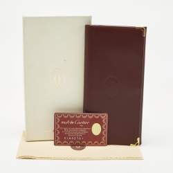 مملوكة مسبقًا Cartier Burgundy Leather Must De Cartier Bi Fold Long Wallet