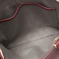 مملوكة مسبقًا حقيبة ساتشل كارتييه سي دو كارتييه جلد أحمر داكن متوسطة