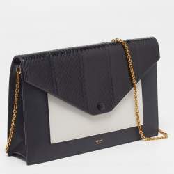 Pre Owned حقيبة كلتش سيلين بشنطة جيب، جلد أبيض وأسود وسلاسل من جلد الثعبان