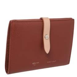 Pre Owned Celine Copper Brown/Pink Grained Leather Multifunction Strap Wallet