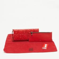 Pre Owned CH Carolina Herrera Red Monogram Embossed Leather Trifold Wallet