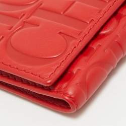 Pre Owned CH Carolina Herrera Red Monogram Embossed Leather Trifold Wallet
