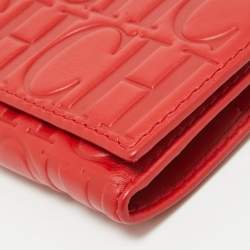 Pre Owned CH Carolina Herrera Red Monogram Embossed Leather Trifold Wallet