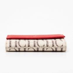 Pre Owned محفظة سي إتش كارولينا هيريرا جلد وكانفاس مقوى مونوغرامي أحمر/أوف وايت بقلاب