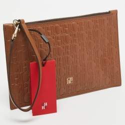 Pre Owned CH Carolina Herrera Brown Monogram Embossed Leather Wrsitlet Clutch