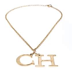 Pre Owned CH Carolina Herrera Logo Charm Gold Tone Long Toggle Pendant Necklace