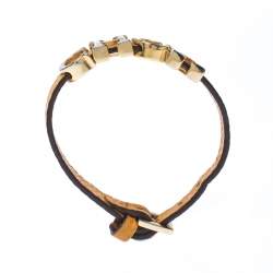 Pre Owned CH Carolina Herrera Yellow Leather Gold Tone Logo Charm Bracelet