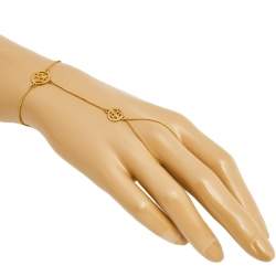 Pre Owned CH Carolina Herrera Gold Tone Logo Finger Attached Bracelet 