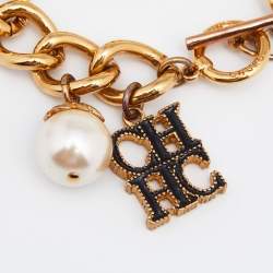 Pre Owned CH Carolina Herrera Faux Pearl Gold Tone Toggle Bracelet