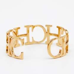 Pre Owned CH Carolina Herrera Gold Tone Between the Line Open Cuff Bracelet