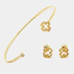 Pre Owned CH Carolina Herrera Gold Tone Petite Rosetta Insignia Cuff Bracelet & Stud Earrings Set