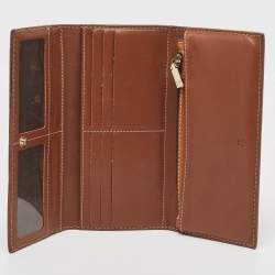 Pre Owned CH Carolina Herrera Brown Monogram Embossed Leather Trifold Continental Wallet