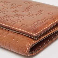 Pre Owned CH Carolina Herrera Brown Monogram Embossed Leather Trifold Continental Wallet