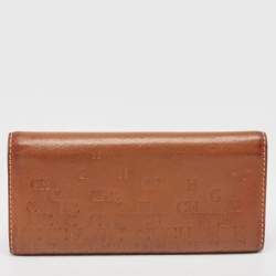 Pre Owned CH Carolina Herrera Brown Monogram Embossed Leather Trifold Continental Wallet
