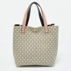 Pre Owned حقيبة يد كارولينا هيريرا قفل ماترايوشكا جلد وكانفاس مقوى مونوغرامى وردية / بيج 