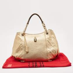 Pre Owned CH Carolina Herrera Gold Monogram Embossed Leather Dahlia Hobo