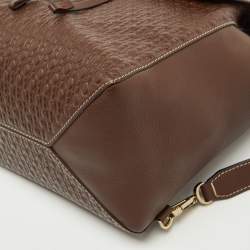 CH Carolina Herrera Brown Monogram Embossed Leather Flap Backpack