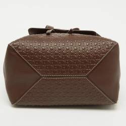 CH Carolina Herrera Brown Monogram Embossed Leather Flap Backpack