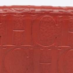 CH Carolina Herrera Rust Orange Monogram Leather Flap Continental Wallet