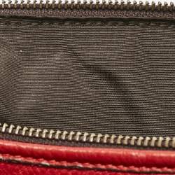 CH Carolina Herrera Red Monogram Embossed Leather Tassel Hobo