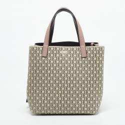 Pre Owned CH Carolina Herrera Pink/Beige Monogram Coated Canvas Small Matryoshka Locked Tote