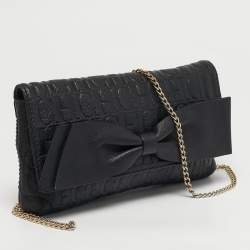 مملوكة مسبقًا حقيبة كتف بسلسلة قلاب بعقدة من جلد منقوش بشعار أسود سي إتش كارولينا هيريرا