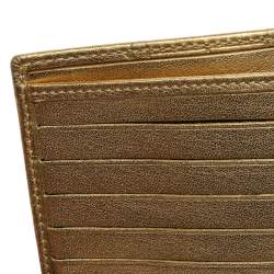 مملوكة مسبقًا Carolina Herrera Metallic Gold Monogram Leather Trifold Wallet