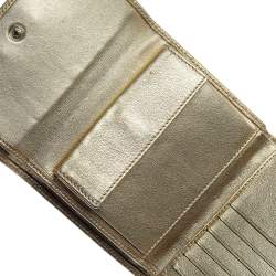 مملوكة مسبقًا Carolina Herrera Metallic Gold Monogram Leather Trifold Wallet