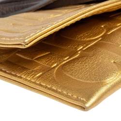 Pre Owned Carolina Herrera Gold Monogram Leather Tassel Clutch