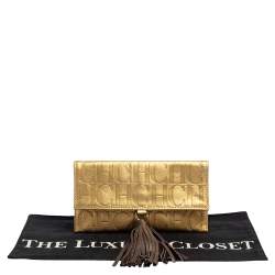Pre Owned Carolina Herrera Gold Monogram Leather Tassel Clutch