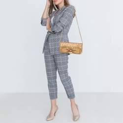 Pre Owned Carolina Herrera Gold Monogram Embossed Leather Bow Chain Clutch